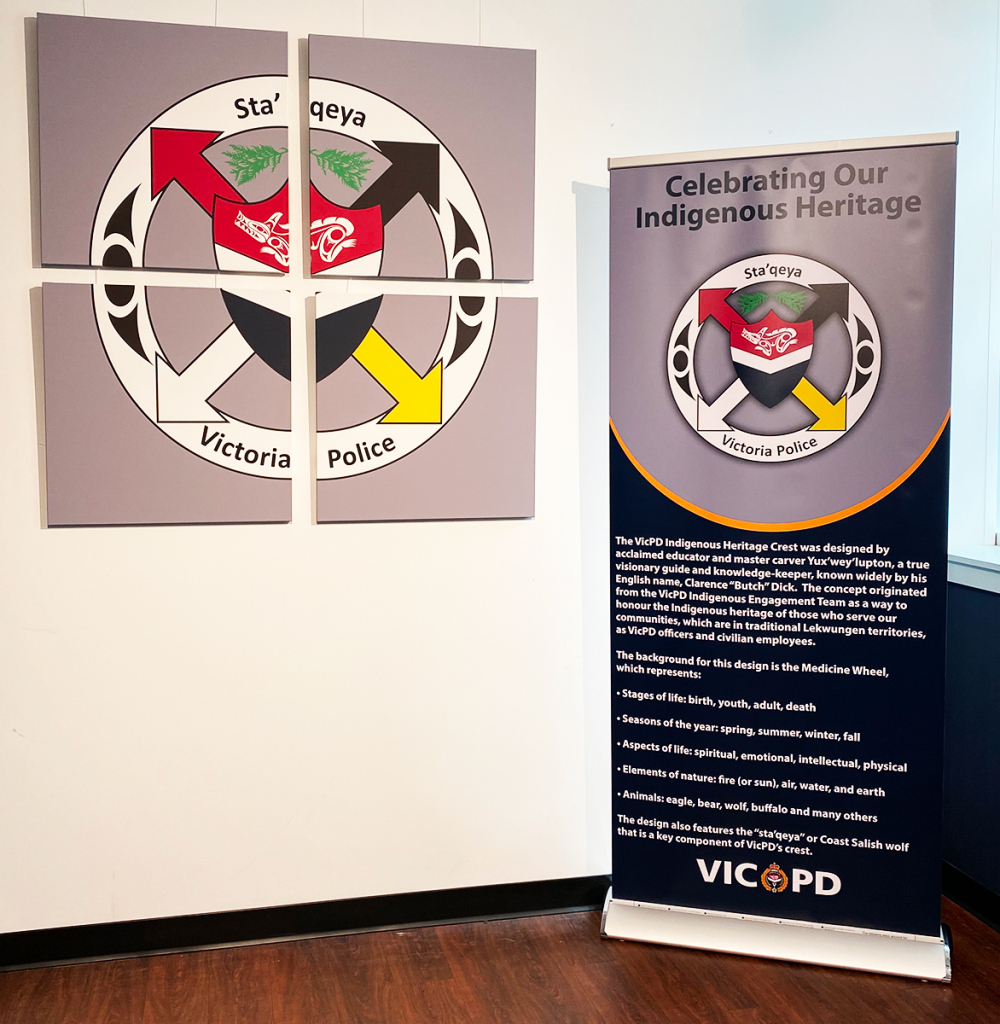 A banner with VicPD’s Indigenous Heritage Crest and canvases of the symbol are on public display in VicPD’s Hall of Honour.